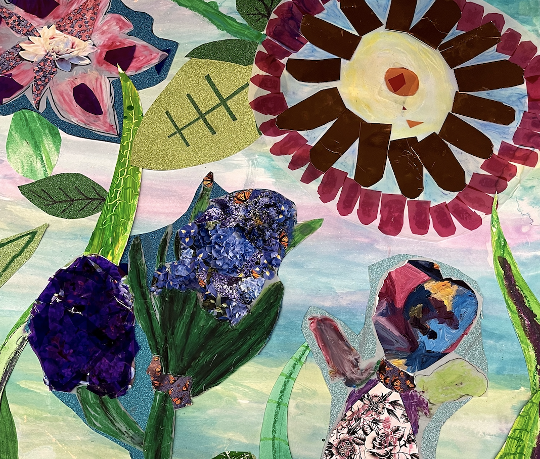 Close-up of student artwork: collage of bright colored flowers, stems & leaves created from paper cutouts, cellophane, decorated with paint & marker.